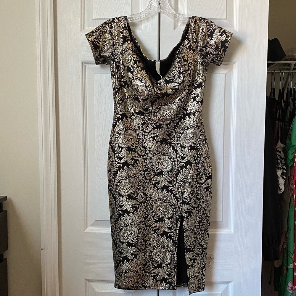 A black a gold dressed perfect for a glamour party